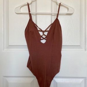 XS Express One Eleven Strappy Back Thong Bodysuit